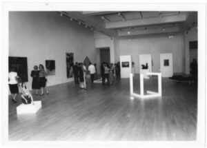Patrons view an exhibit in the Weatherspoon Art Gallery in the Cone Building, 1990